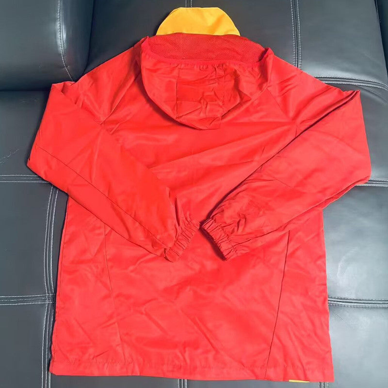 Casaco vermelho e amarelo 2026/27 fecho completo com capa
