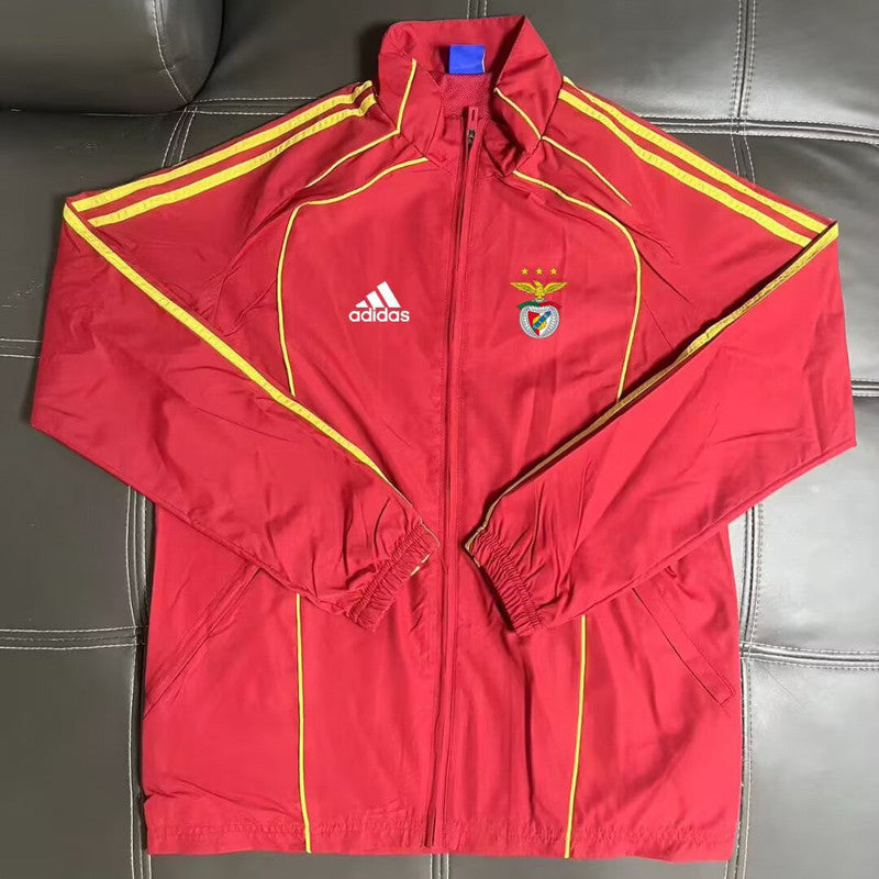 Casaco vermelho e amarelo 2026/27 fecho completo