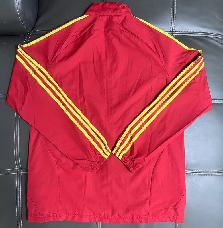 Casaco vermelho e amarelo 2026/27 fecho completo