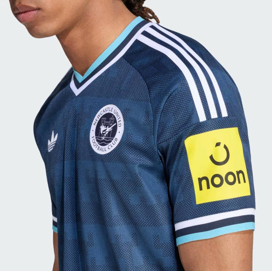 Camisola Newcastle Alternativa 26/27