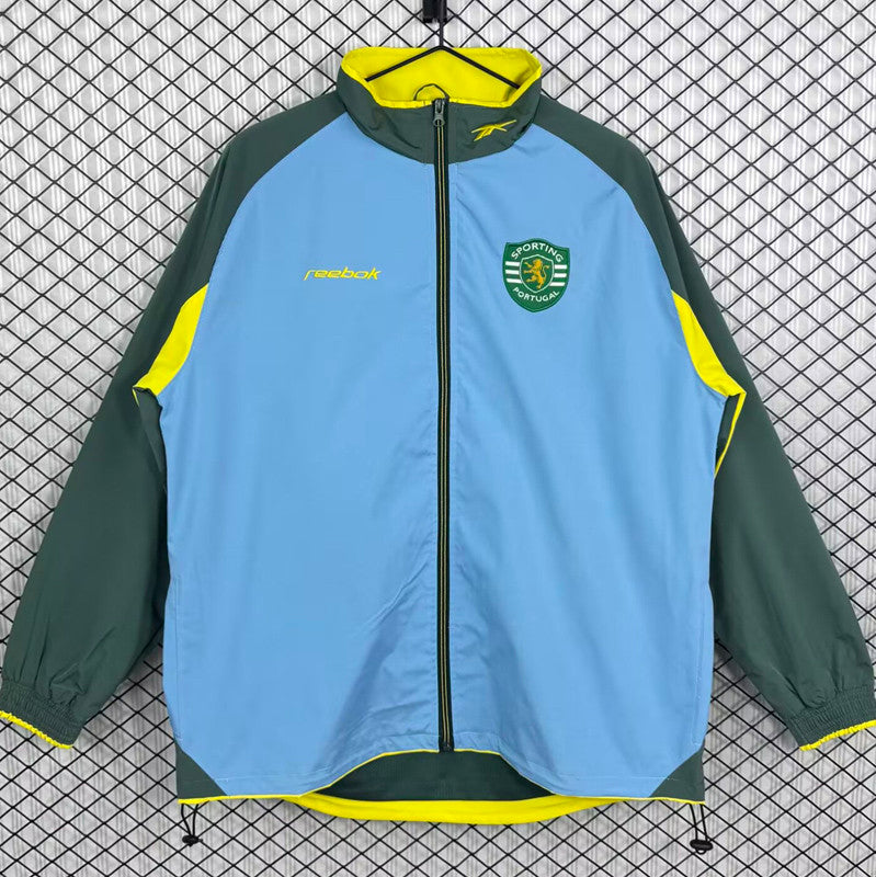 Casaco azul/verde leão 2026/27 fecho completo - corta vento