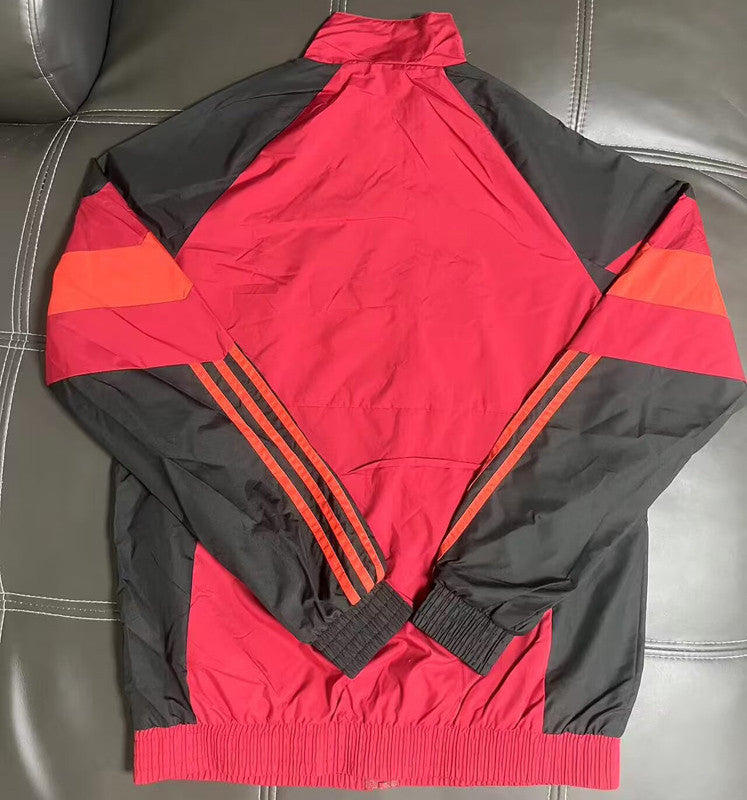 Casaco vermelho e preto 2026/27 fecho completo